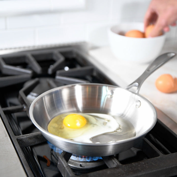 8 inch Stainless Steel Skillet frying an egg on a stove#option_8-inch