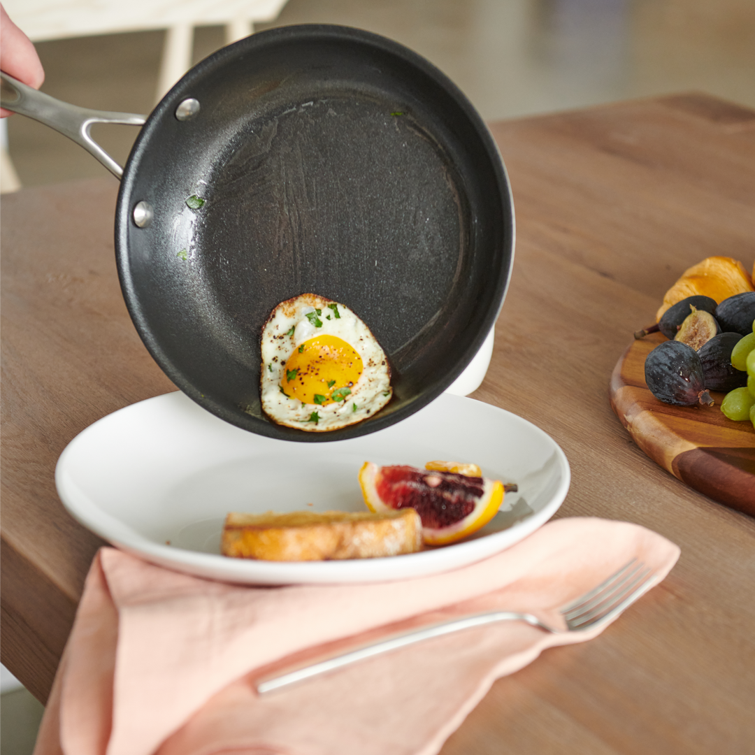 Nonstick Skillet 8-inch with fried egg over a plate of toast and fruit#option_8-inch