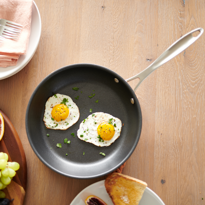 10 inch Nonstick Skillet with 2 fried eggs on a counter#option_10-inch